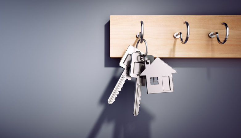 Keys with house keyring on key rack